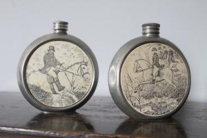 Pair of antique English Sheffield silver liquor holders, 19th century, with engraved designs.